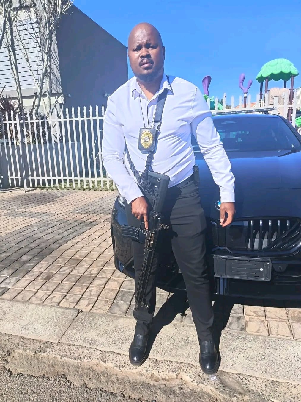 Executive protection officer with escort vehicle